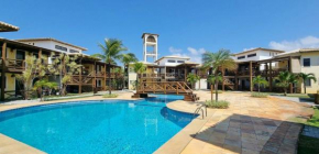 204 - Village aconchegante em frente a praia de Itacimirim